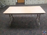 60 inch x 30 inch folding table (sold times the money)