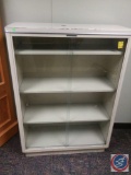 Yawman and Free Mfg, 4 shelf glass door cabinet. 14 x 36 x51 inches