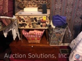 Hassock Containing Scrapbooking Supplies, Caboodle Makeup Box, Wicker Basket, Bag of Bags, Wooden