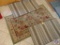 (2) Gray and Beige Striped Area Rugs Measuring 2' x 4'; and One Rubber Backed Oriental Style 3' x 5'