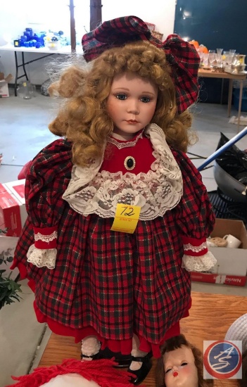 Doll on a Stand Dressed in Holiday Attire