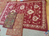 Garen Ridge 5' x 7' Maroon Area Rug, and (2) Carved Maroon Entry Rugs
