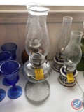 (3) Hurricane Oil Lamps, One is Pottery and Two are Clear Glass