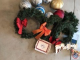 (4) Wreaths, (6) Large Ornaments, a Snowman Baking Pan, (2) Santa Heads, and Easter Bunnies. Card