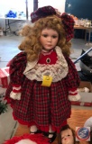 Doll on a Stand Dressed in Holiday Attire