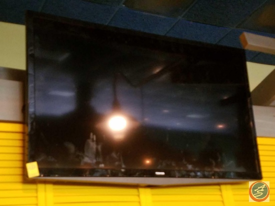 Toshiba 50" Television {{MODEL NUMBER IS NOT VISIBLE DUE TO THE MOUNTING BRACKET. BUYER MUST BRING