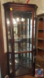 Howard Miller Glass and Wood Lighted Curio Cabinet Door is 22