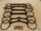 (3) pairs of bits, 6 in. jointed Snaffle - 5 in. solid bar log bit - 6 in. saw tooth with original