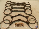 (3) pairs of bits, 6 in. Snaffle jointed ring - 7 in. saw tooth - 5 in. solid bar log bit