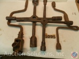 (4) lug Wrenches including four way long crank - four way Black Hawk - four way Walden Worcester