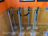 (7) Tensabarrier Stanchions and a Free Standing Sign Holder