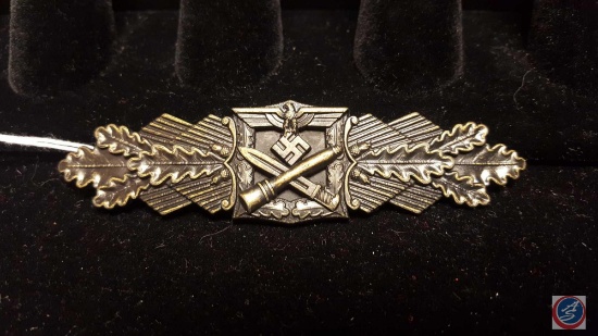 German WWII Army Heer Bronze Close Combat Clasp. The front shows a German eagle with a crossed