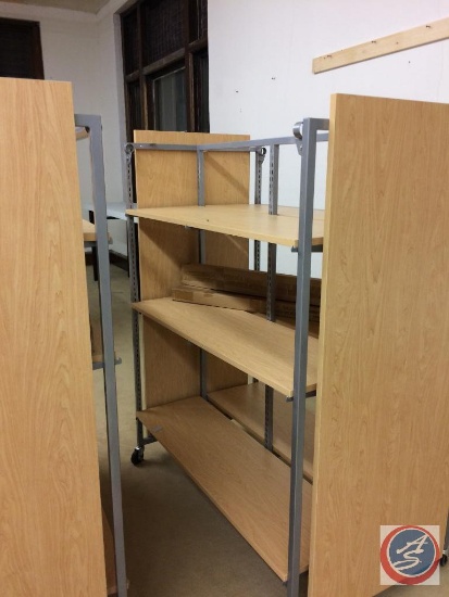 {{2X$BID}} (2) Rolling Shelving Units, includes 6 shelves per unit, can be used for hanging