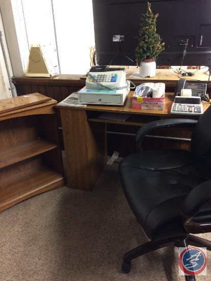 Desk, book case, rolling leather desk chair, Uniden Phone, calculator, calculator tape, Royal 325cx