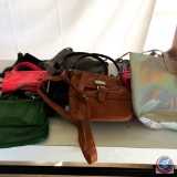 Purses including a Justice and Nine West