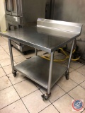 Universal Two Tier Prep Table on Casters Measuring 36