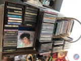 Cassettes and CD's Including Rod Stewart, Eagles, Lenny Kravits, Celine Dion, Hillary Duff, Adele,