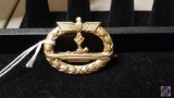 German WWII Naval Kriegsmarine U-Boat Submarine Badge. The front shows the profile of a German