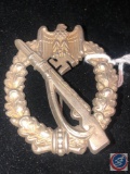 German WWII Army Silver Infantry Assault Badge. The front shows a Mauser rifle in the center with a