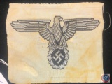 German WWII Waffen SS Officers Sports Shirt Eagle. Measures 4 3/4? wide by 4? tall. The front shows