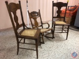 (2) Vintage Kitchen Chair with Floral Engraving On The Backs and Cane Seating and (1) Vintage Armed