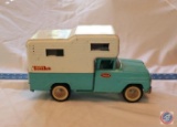Vintage Turquoise Blue Camper Truck with Pittsburgh Steelers Logo on Camper