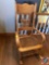 Vintage Spindle Back Rocking Chair with Caning Seat