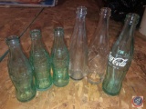 Vintage (1) 10 Fl Oz Coca-Cola Bottle, (3) 6 Fl Oz Coca-Cola Bottles and (2) Clear Bottles [[ALL