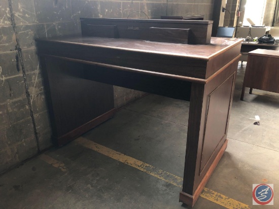 Antique / vintage wood lobby table / stand. The middle area serves as a cabinet to hold the months