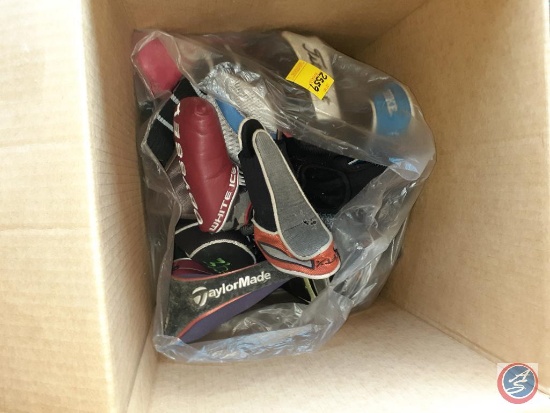 Variety of Golf Club Covers Including Three Balls, Titleist, and Wilson