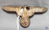 German WWII Waffen SS Officers Visor Cap Eagle. The reverse side is maker marked 'RZM M1/52'. Has