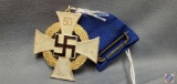 German WWII NSDAP 50 Year Faithful Service Cross. The front shows a swastika in the center of a