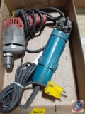 1/4'' Electric Makita Drill and Makita 4'' Disc Grinder Model No. N9501B