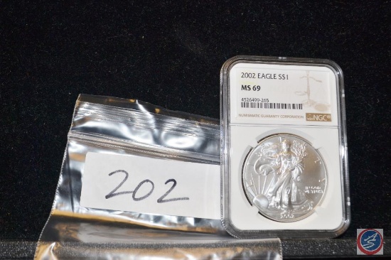 2002 Eagle 1 Dollar slabbed and graded MS9