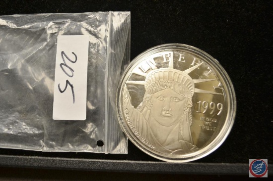 1999 Liberty 4 oz Platinum Layered .999 Silver Coin measures 3.5 inches