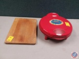 Two pieces- oak cutting board and a Salto Santa Fe Quesadilla Maker