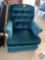 Upholstered Swiveling Rocking Arm Chair
