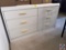 Six Drawer Dresser Measuring 50'' x 18 1/2'' x 31 1/2''. See photo for some apparent water damage on