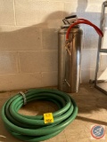 Chemical Sprayer and Two Garden Hoses