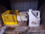 Plastic Crate, 2.5 Gallon Jug of Round Up Power Max, and M300 Power Queen Marine Box