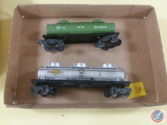 Lionel 81304 Two Dome Northern Pacific Tank Car and Lionel 6415 Three Dome Tank Car