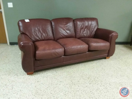 1 leather sofa with some damage measurements are 84x36x38