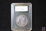 1881 $1 Double Eagle silver dollar in a slab, not graded