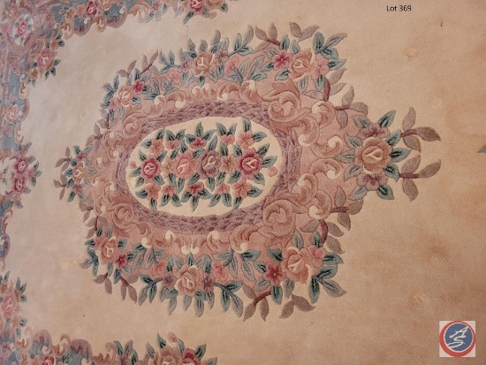 11' X 8' Peach colored floor rug