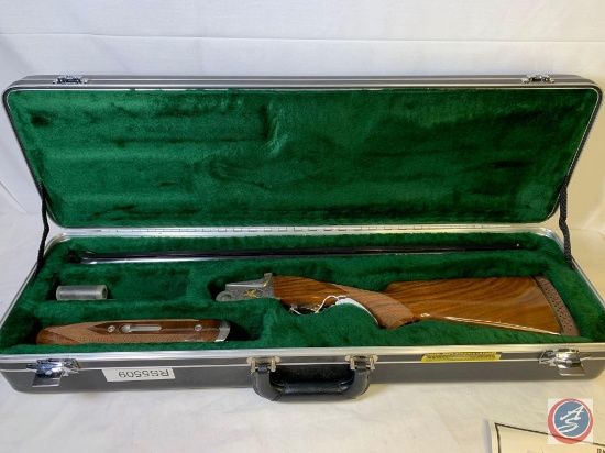SKB model 686 12 GA 3" Shotgun Over Under Shot Gun, Gold trigger, factory engraving and finely