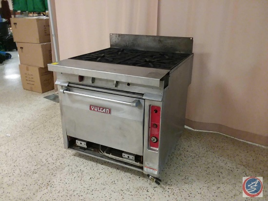 Vulcan 4 burner stove with oven measuring 34'' X 39'' X 33'' {{some parts missing see photos, No