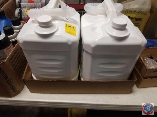 (2) 2.5 gallon jugs of DEF fluid and miniature flashlights
