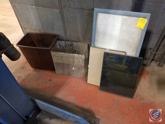 Picture Frames And Trash Can
