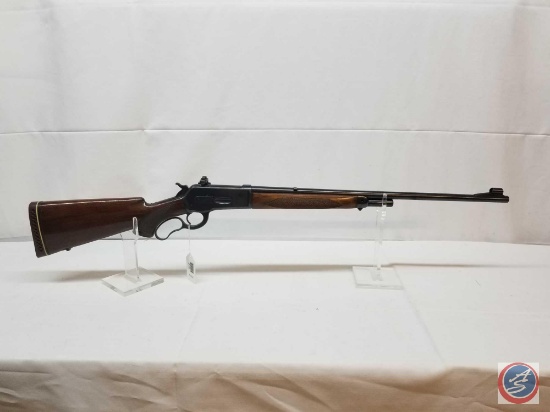Winchester Model 71 348 WCF Rifle Lever Action Rifle with factory checkered stock and target sights.