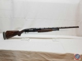 Winchester Model 12 Shotgun 12 GA Pump Action trap grade Shotgun with checkered stocks and 30 inch
